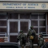 Police in tactical gear enter one of the Federal Bureau of Prisons buildings around the MDC detention center in New York City on Jan. 5, 2026. Photo by Alexi J. Rosenfeld/Getty Images.