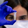 Technicians carry out a diagnostic test for COVID-19 in a lab at Rambam Hospital in Haifa, Israel, on March 17, 2020. Photo by Yossi Aloni/Flash90.