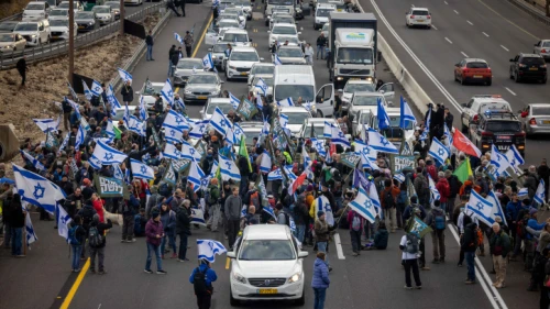 Protesters block Route 1 between Tel Aviv and Jerusalem over the Israeli government's judicial reforms, Feb. 9, 2023. Photo by Yonatan Sindel/Flash90.