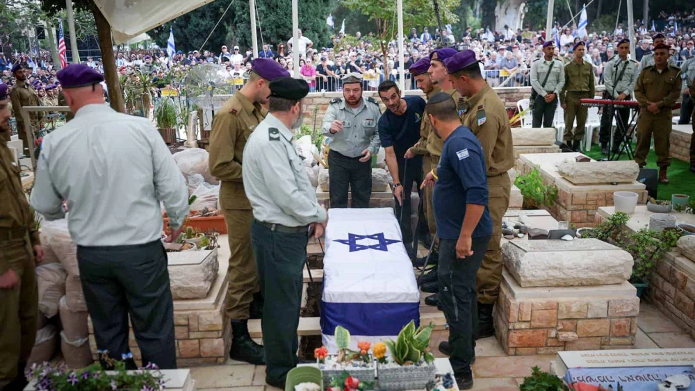 Family and friends attend the funeral of Israel Defense Forces Lt. Hadar Goldin, whose body had been held captive by Hamas in Gaza since 2014, at the Kfar Saba military cemetery, Nov. 11, 2025. Photo by Chaim Goldberg/Flash90.
