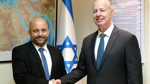 Eyal Hulata (left) with his successor as head of Israel's National Security Council, Tzachi Hanegbi, January 2023. Credit: Amos Ben-Gershom/GPO.
