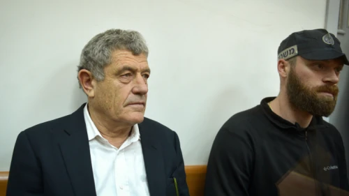 Israeli businessman Miki Ganor (left), arrested in the defense-industry affair also known as “Case 3000,” is brought for a court hearing at the Magistrate's Court in Rishon Letzion on March 20, 2019. Photo by Flash90.