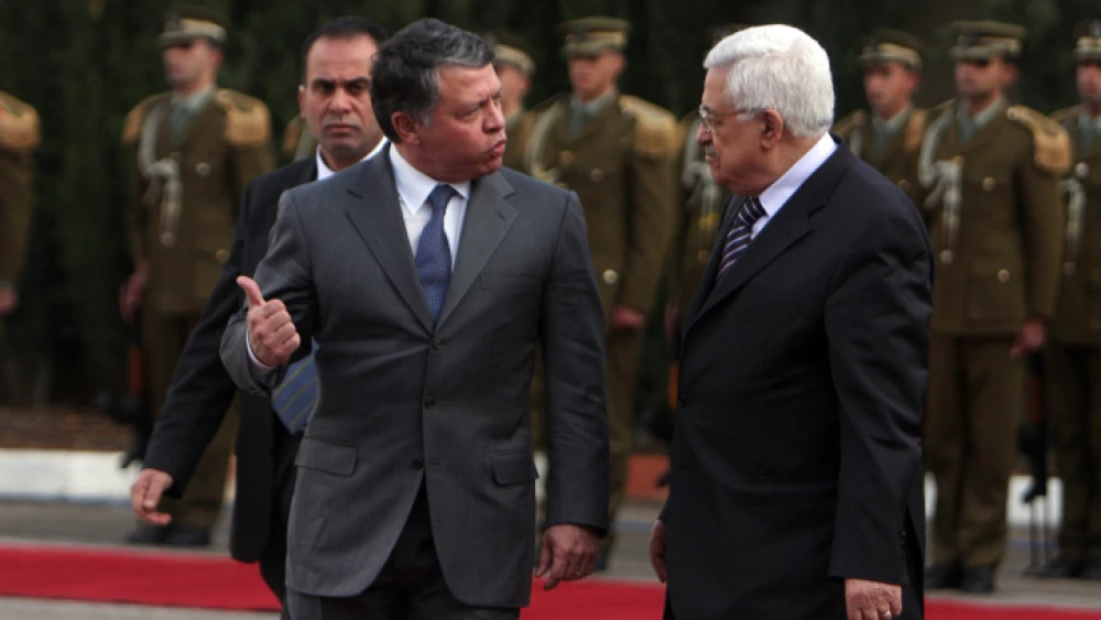 Palestinian Authority President Mahmoud Abbas (front R) and King Abdullah of Jordan (front L) at a welcoming ceremony for the monarch in the West Bank city of Ramallah, Nov. 21, 2011. Photo by Issam Rimawi/Flash90.