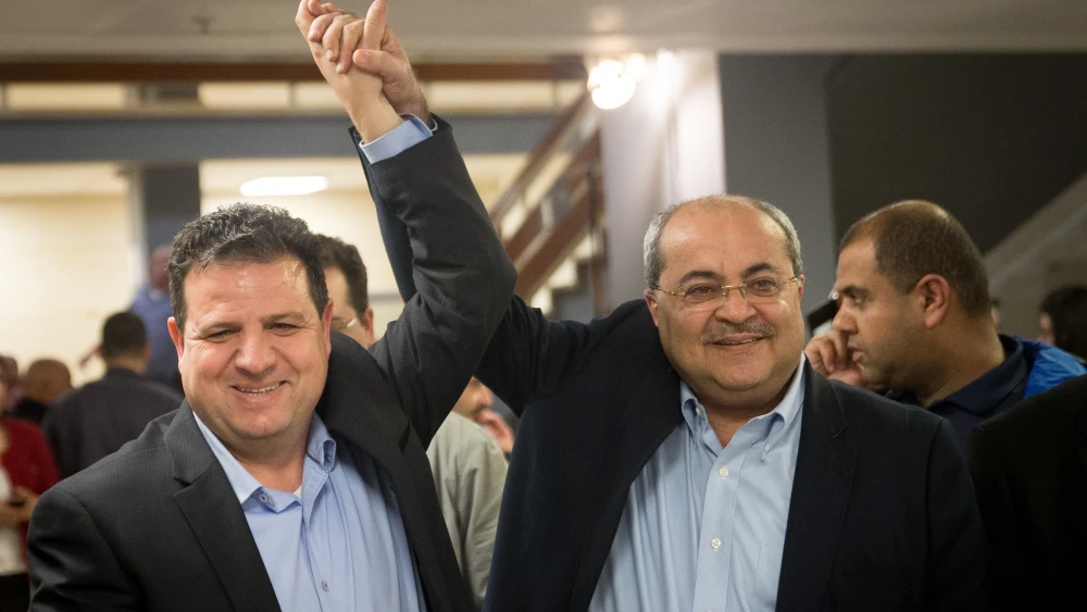 Israeli parliament members Ayman Odeh and Ahmad Tibi outside the Elections Committee, where political parties running for a spot in the April 9 Israeli elections present their party list, on Feb. 21, 2019. Photo by Yonatan Sindel/Flash90.