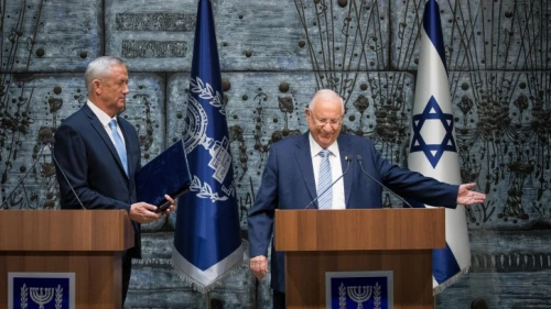 Israeli President Reuven Rivlin presents Blue and White Party leader Benny Gantz with the mandate to form a new Israeli government, at the President's Residence in Jerusalem on Oct. 23, 2019. Photo by Yonatan Sindel/Flash90.