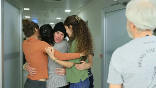 Freed American-Israeli hostage Keith Siegel, accompanied by his wife, Aviva, reunites with his daughters Elan, Gal and Shir, and his brother Lee, at Sourasky Medical Center (Ichilov Hospital) in Tel Aviv on Feb. 1, 2025. Photo by Ronen Harish/GPO.
