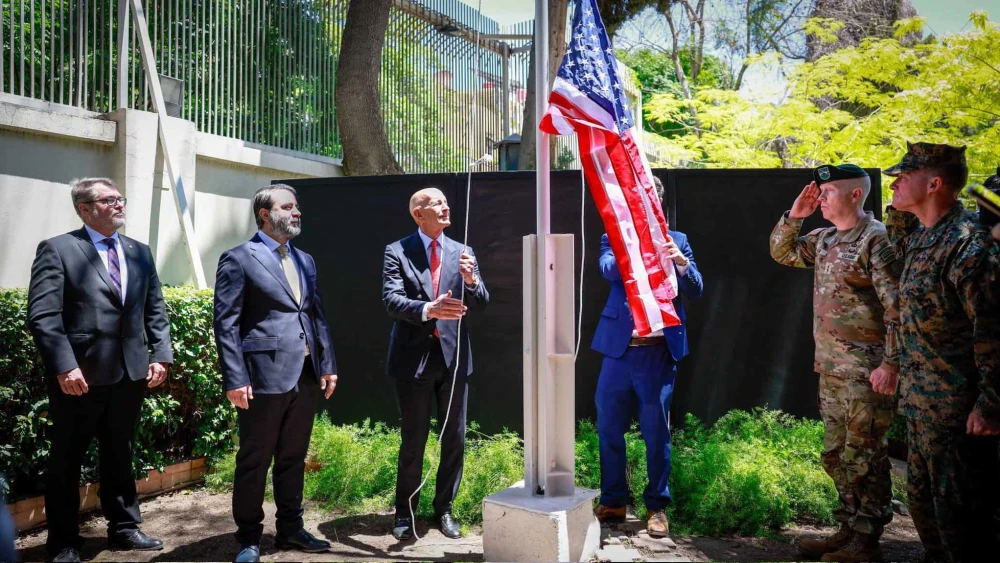 U.S. Ambassador Tom Barrack raises the American flag over the ambassador’s residence in Damascus for the first time since 2012, May 29, 2025. Source: @USAMBTurkiye/X.
