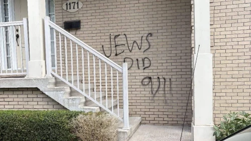 Antisemitic graffiti defaces a building associated with Chabad-Lubavitch of the Maritimes Rohr Family Institute in Halifax, Canada, on Sept. 14, 2025. Source: @IsraelaMTL/X.
