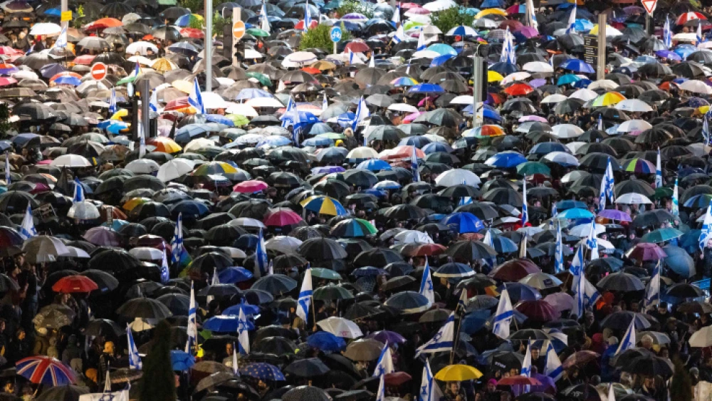 Thousands of Israelis protest against the proposed changes to the legal system at Habima square in Tel Aviv, Jan. 14, 2023. Photo by Yonatan Sindel/Flash90.