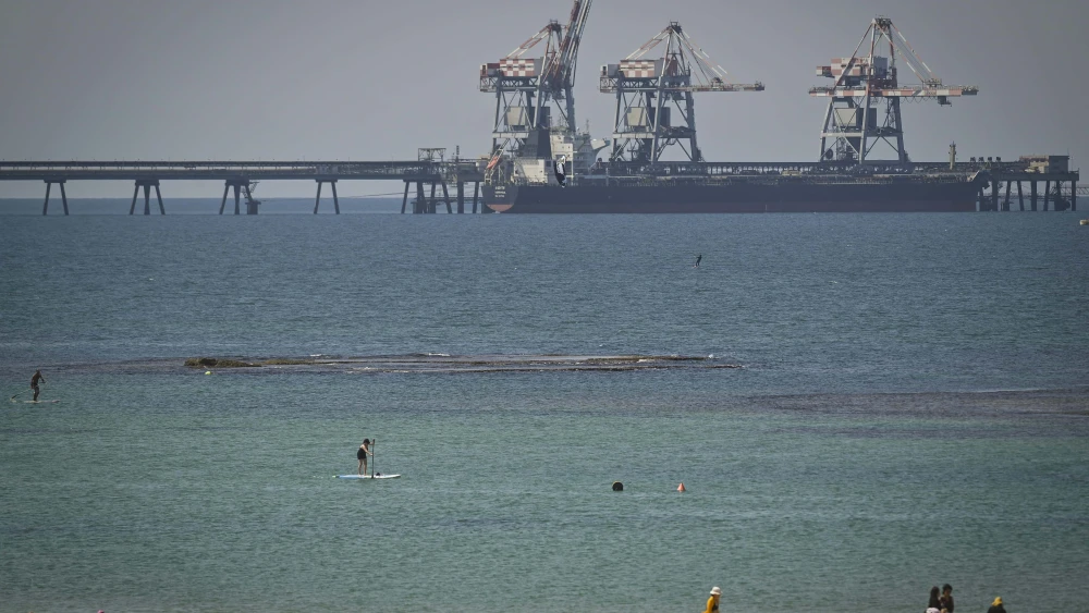 Israelis enjoy a sunny day at the beach north of the Hadera powerplant, near Kibbutz Sdot Yam, Sept. 12, 2024. Photo by Michael Giladi/Flash90.