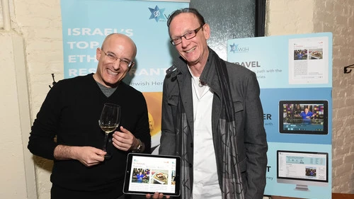 Israeli food critic Gil Hovav (left) and World Jewish Heritage Organization (WJH) founder Jack Gottlieb during the Jan. 14 launch of WJH's eBook, “Israel’s Top 100 Ethnic Restaurants,” at New York City's Balaboosta restaurant. Credit: Shahar Azran.
