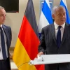 Israeli Prime Minister Benjamin Netanyahu presenting part of a drone shot down during a meeting with Germany's foreign minister in Tel Aviv on May 20, 2021. Credit: Kobi Gideon/GPO.