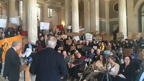 Dr. Charles Jacobs (left, at podium) speaks out against Syrian refugee absorption on Monday at the Rhode Island State House. Credit: Courtesy Americans for Peace and Tolerance.
