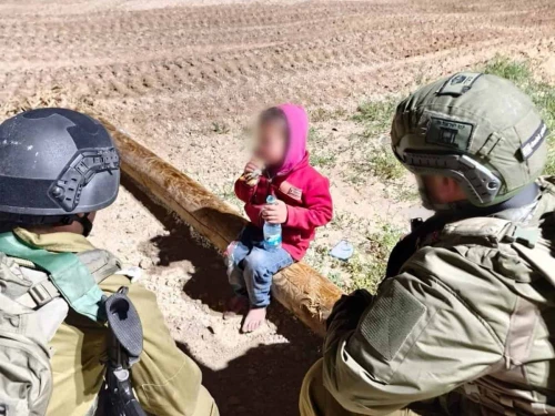 A child who said he was sent by Hamas is greeted by Israeli soldiers at an IDF post in the Gaza Strip on March 11, 2025. Credit: IDF.