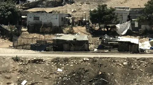 Bedouin outposts in the E1 area. Logos for the European Union can be seen on the buildings. Photo by Eliana Rudee.