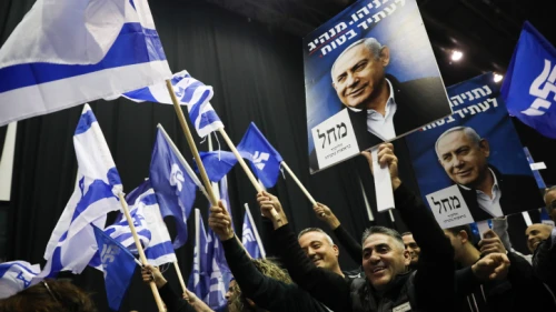 Likud supporters react to the results of polls on election night at Likud Party headquarters in Tel Aviv, March 2, 2020. Photo by Olivier Fitoussi/Flash90.