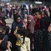 Tens of thousands of Palestinians from the northern Gaza Strip walk through a humanitarian corridor to the safety of southern Gaza, Nov. 10, 2023. Photo by Majdi Fathi/TPS.