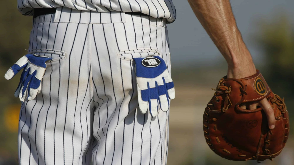 An Israeli baseball player from the Beit Shemesh Blue Socks team during a game in Kibbutz Gezer, July 26 2007. Photo by Nati Shohat/Flash90.