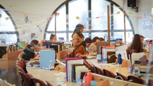 Students at the Lindenbaum Seminary (Midrasha) in Jerusalem, which has been divided into study areas in order to comply with social distancing directives, on July 7, 2020. Photo by Gershon Elinson/Flash90.