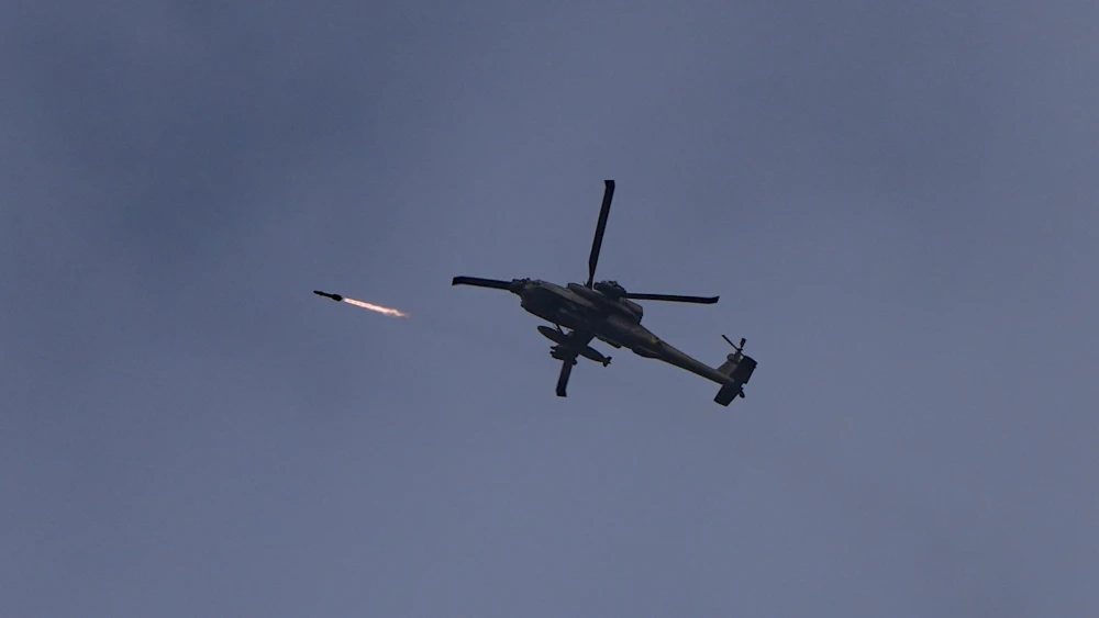 An Israel Defense Forces helicopter fires a missile toward Hezbollah terrorists, near the Israeli-Lebanese border, May 2, 2026. Photo by Ayal Margolin/Flash90.