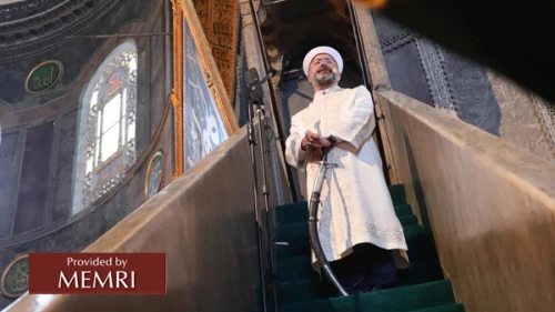 Turkey’s top Muslim cleric, professor Ali Erbaş, holds a sword on his way to deliver a Friday sermon the Hagia Sophia mosque in Istanbul on July 24, 2020. Credit: MEMRI.