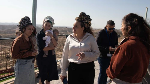 Tzofia Lichtenstein with other women from the new settlement of Mitzpe Ziv in the Hebron Hills speaks to journalists, Nov. 27, 2025. Photo by David Isaac.