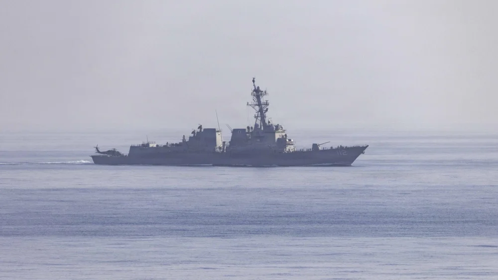 A U.S. Navy guided-missile destroyer is seen during a blockade mission targeting traffic to and from Iranian ports, in an undated image released by U.S. Central Command on April 15, 2026. Source: @CENTCOM/X.
