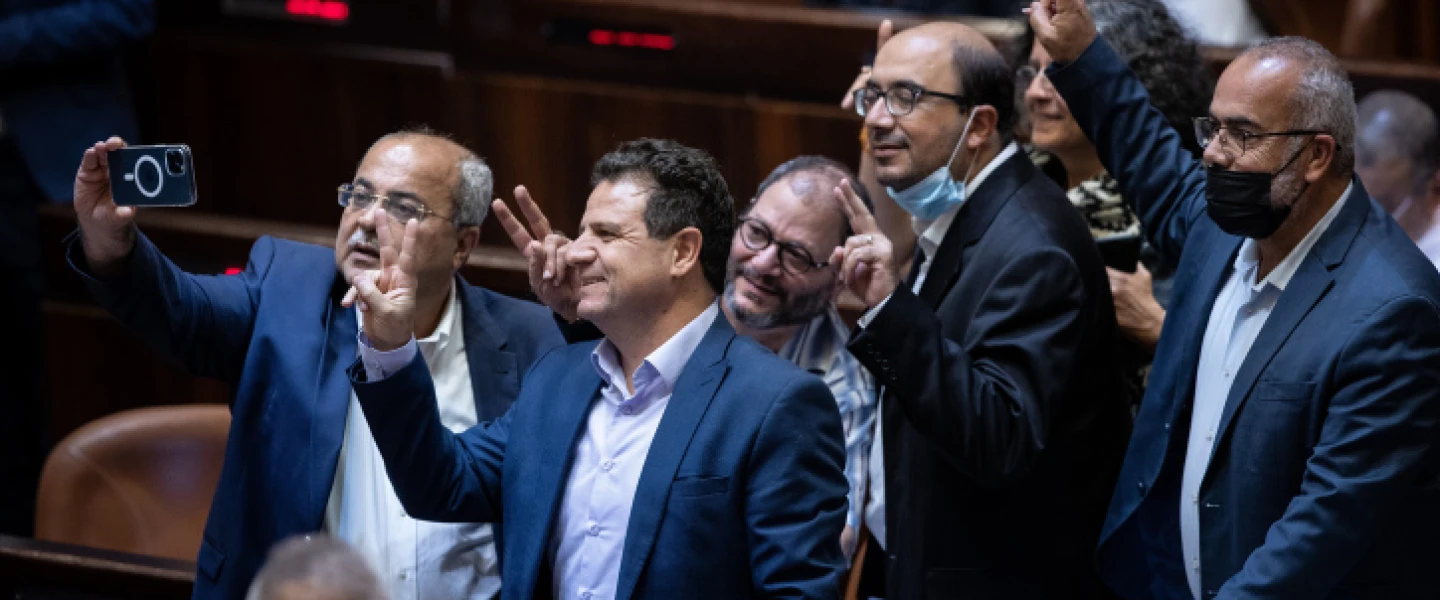 Members of the Arab Joint List take a selfie following a discussion on the "family reunification law", during a plenum session in the assembly hall of the Israeli parliament, in Jerusalem, on July 6, 2021. Photo by Yonatan Sindel/Flash90.