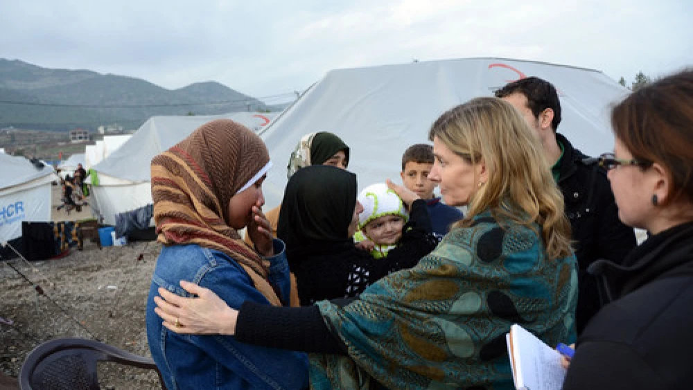 Nancy Lindborg, USAID's assistant administrator for democracy, conflict and humanitarian assistance, interacts with Syrian refugees at the Islahiye Refugee Camp in Turkey on Jan. 24, 2013. Credit: U.S. State Department.