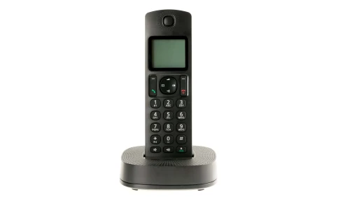 A cordless phone with a charging station that connects to a landline. Credit: 2ban/Shutterstock.