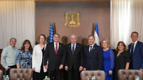 Israeli Prime Minister Benjamin Netanyahu is flanked by Reps. Andrew Clyde (fourth from left) and Marlin Stutzman (third from right) in Jerusalem on May 27, 2025. Photo by Amos Ben-Gershom/GPO.
