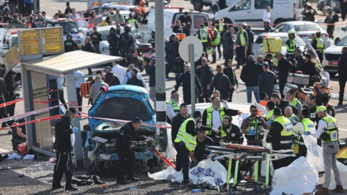 The scene in Jerusalem's Ramot neighborhood after an Israeli Arab drove a car into pedestrians there, Feb. 10, 2023. Photo by Yonatan Sindel/Flash90.