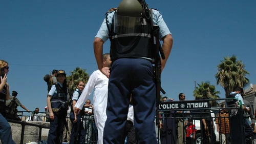 Click photo to download. Caption: Israeli police officers in Jerusalem. Credit: Justin McIntosh via Wikimedia Commons.