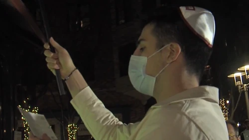 Washington Wizards player Deni Avdija lighting a menorah at a Hanukkah celebration in Rockville, Md. Source: Screenshot.
