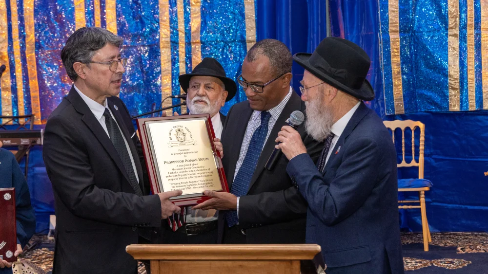 From left: Em Habanim Board of Trustees Member Richard Elgrich, Em Habanim President Albert Ifrah, Dr. Aomar Boum and Rabbi Joshua Bittan. Photo courtesy of Em Habanim.