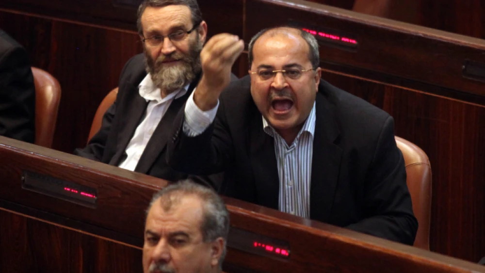 Knesset member Ahmad Tibi calling out during a parliamentary session in the Knesset in Jerusalem on March 22, 2011. Photo by Abir Sultan/Flash90.