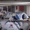 People take shelter in an underground parking lot in Tel Aviv during the war between Israel and Iran, June 24, 2025. Photo by Chaim Goldberg/Flash90.