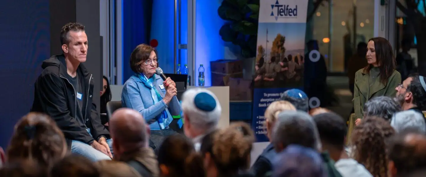 Dudu Baron and Carol Goldfus talk to Benita Levin about caring for wounded IDF soldiers at the Telfed event in Herzliya, Dec. 30, 2025. Photo by Brian Spector.
