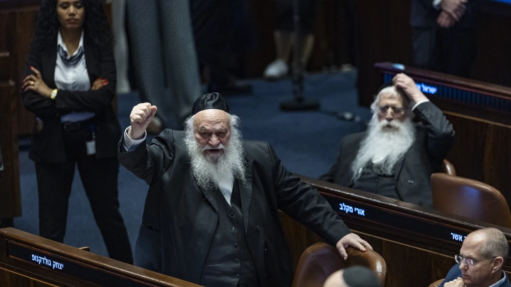 Yitzhak Goldknopf, government ministers and other members of Israel's Knesset attend a plenum session and a vote on a bill to freeze arrests of Haredi draft evaders, July 14, 2026. Photo by Chaim Goldberg/Flash90.