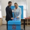 Israeli President Isaac Herzog and his wife Michal cast their ballots in the Israeli general elections, at a voting station in Jerusalem, on Nov. 1, 2022. Photo by Yonatan Sindel/Flash90.