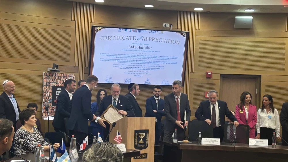 U.S. Ambassador to Israel Mike Huckabee attends the Jerusalem Embassy Tribute Ceremony in honor of Jerusalem Day at the Israeli Knesset, May 28, 2025. Photo by Amelie Botbol.