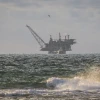 A view of the Israeli Leviathan gas field processing rig from Dor Habonim Beach Nature Reserve, Israel, on Jan. 1, 2020. Photo by Flash90.