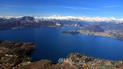 Lake Maggiore with the Alps in the background. Photo by Alessandro Vecchi via Wikimedia Commons.