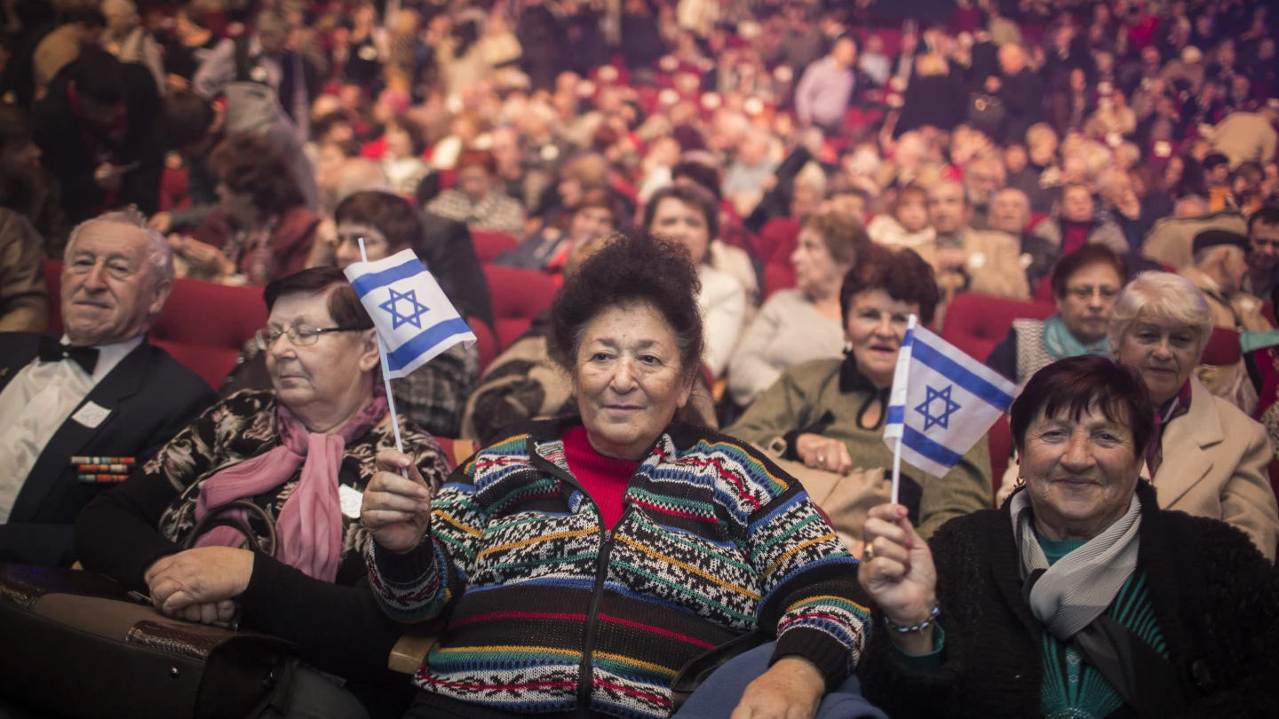 Russian immigrants attend an event marking the 25th anniversary of the great Russian aliyah to Israel from the former Soviet Union at the Jerusalem Convention Center on Dec. 24, 2015. Photo by Hadas Parush/Flash90.