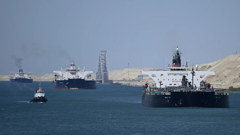 Ships sail along Egypt's Suez Canal near Ismailia on April 16, 2025. Photo by Khaled Desouki/AFP via Getty Images.