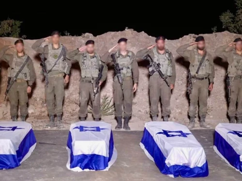 Israel Defense Forces soldiers receive coffins reportedly containing the bodies of four deceased hostages, Oct. 14, 2025. Credit: IDF.