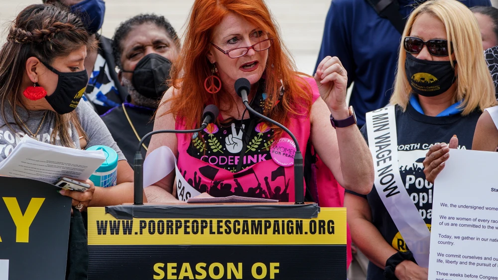 Activist Jodie Evans of Code Pink speaks during a march in Washington DC on July 19, 2021. Photo by Jemal Countess/Getty Images for MoveOn.