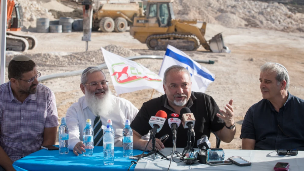 Israeli minister of Defense Avigdor Lieberman visits construction of the new Israeli settlement Amichai, established as the new home for the evacuated residents of Amona, on Oct. 18, 2017. Photo by Hadas Parush/Flash90.