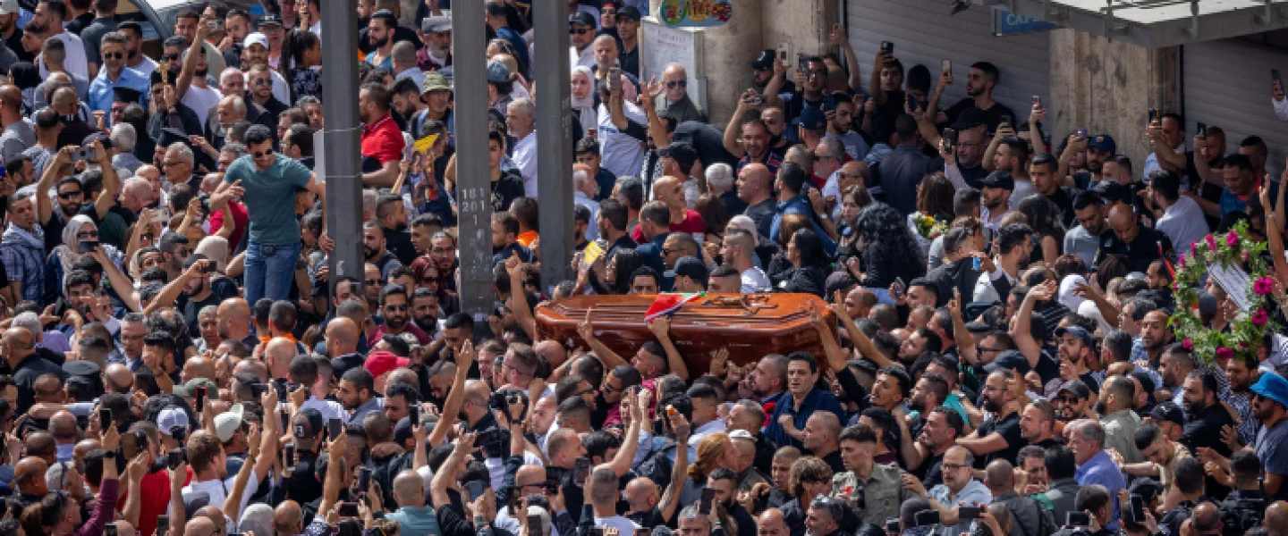The funeral procession of Al Jazeera journalist Shireen Abu Akleh, who was killed in Jenin during clashes between Israeli forces and Palestinian gunmen, at Jaffa Gate in Jerusalem's Old City, May 13, 2022. Photo by Yonatan Sindel/Flash90.