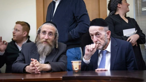 UTJ Knesset members Ya'akov Tessler and Uri Maklev attend a party meeting at the Knesset, Dec. 5, 2022. Credit: Olivier Fitoussi/Flash90.